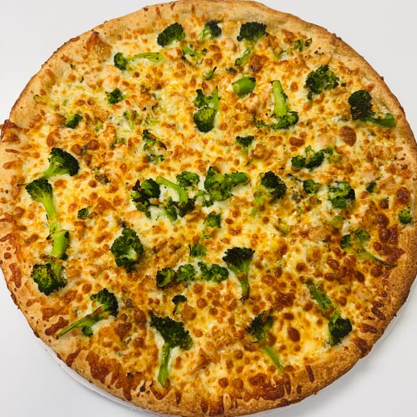 Paramount Pizza 3's chicken and broccoli pizza, topped with melted cheese and a golden crust.